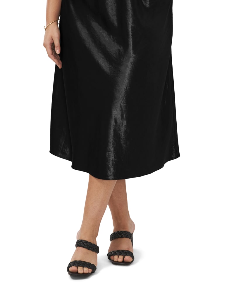 Front of a model wearing a size 1X Kendall A Line Midi Skirt in RICH BLACK by Vince Camuto. | dia_product_style_image_id:260927